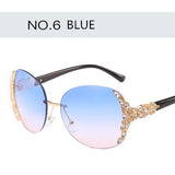 Fashion unique Rimless Crystal decoration sunglasses for women vacation beach sun glasses brand designer oculos de sol Shades